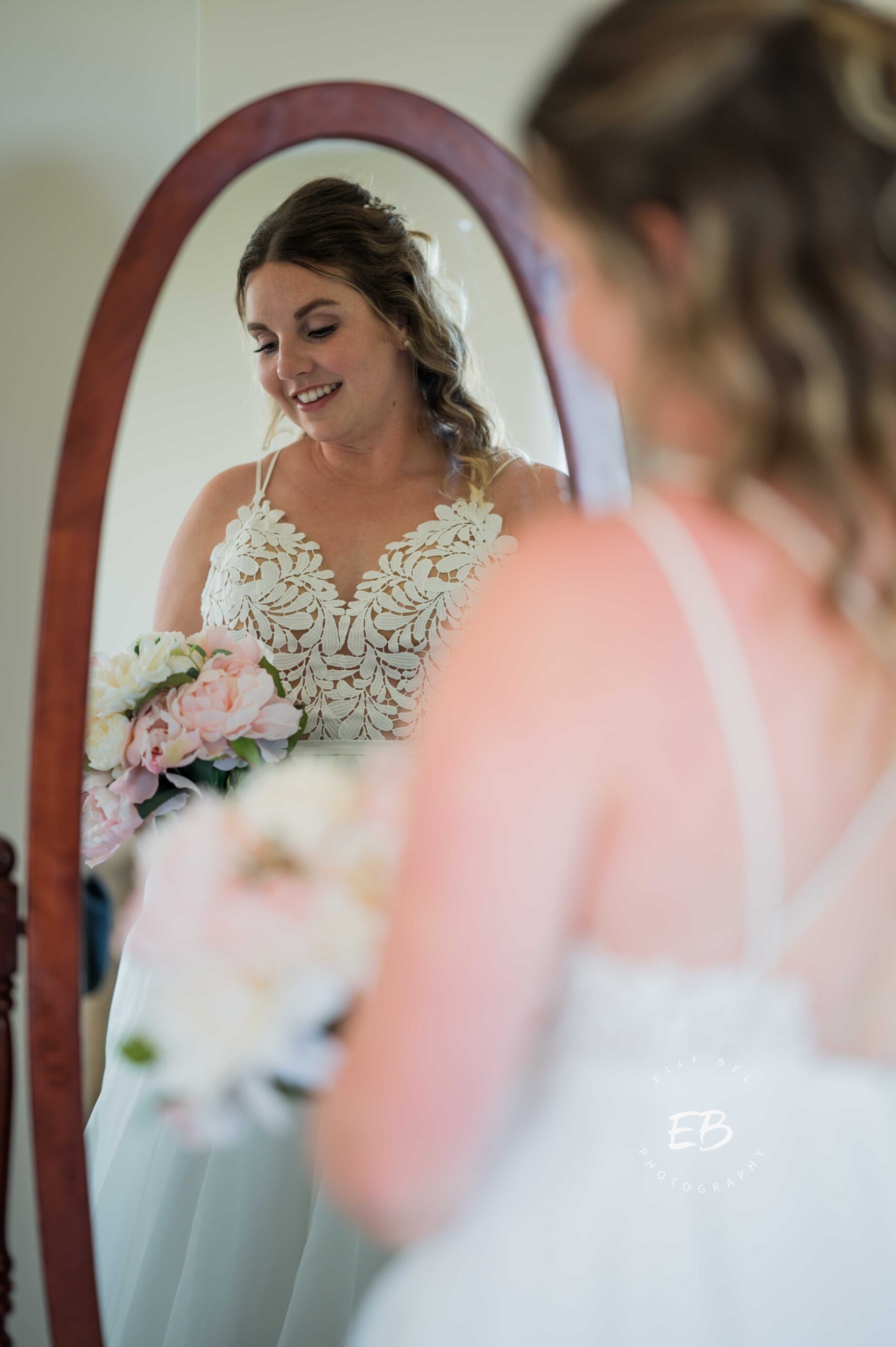 bride in front of a mirror