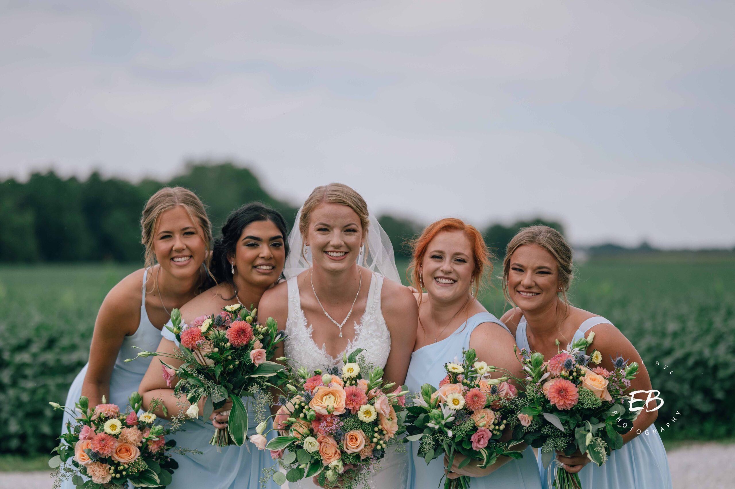 bride and bridesmaids posing