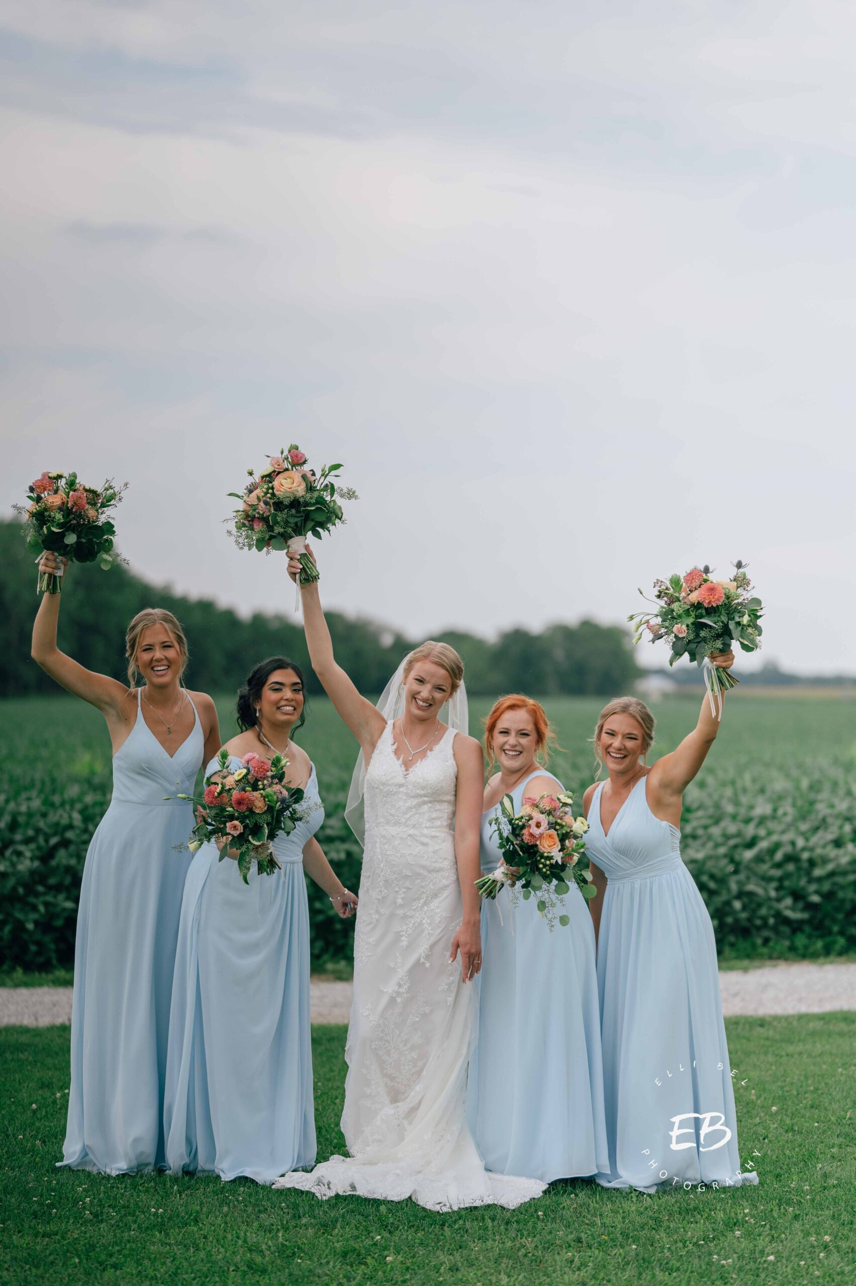 bride and bridesmaids posing